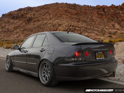 IS300 w Altezza bumpers and tail light covers and L-Tuned rear wing and TRD sideskirts and Kakimoto R exhaust Work Emotion XD9 RedRock